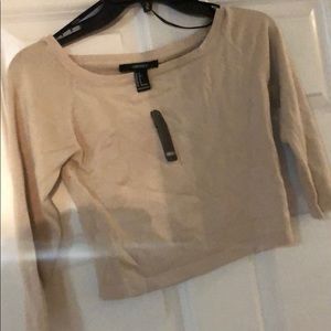 Beige off the shoulder shirt